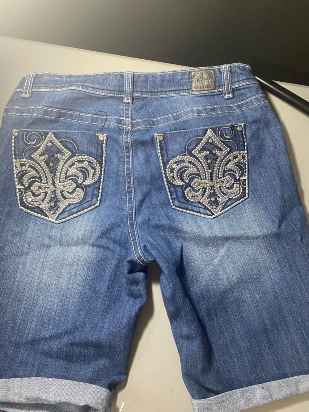 Love Nation Blue Boyfriend Jeans with Rhinestone Fleur-de-Lis Pockets